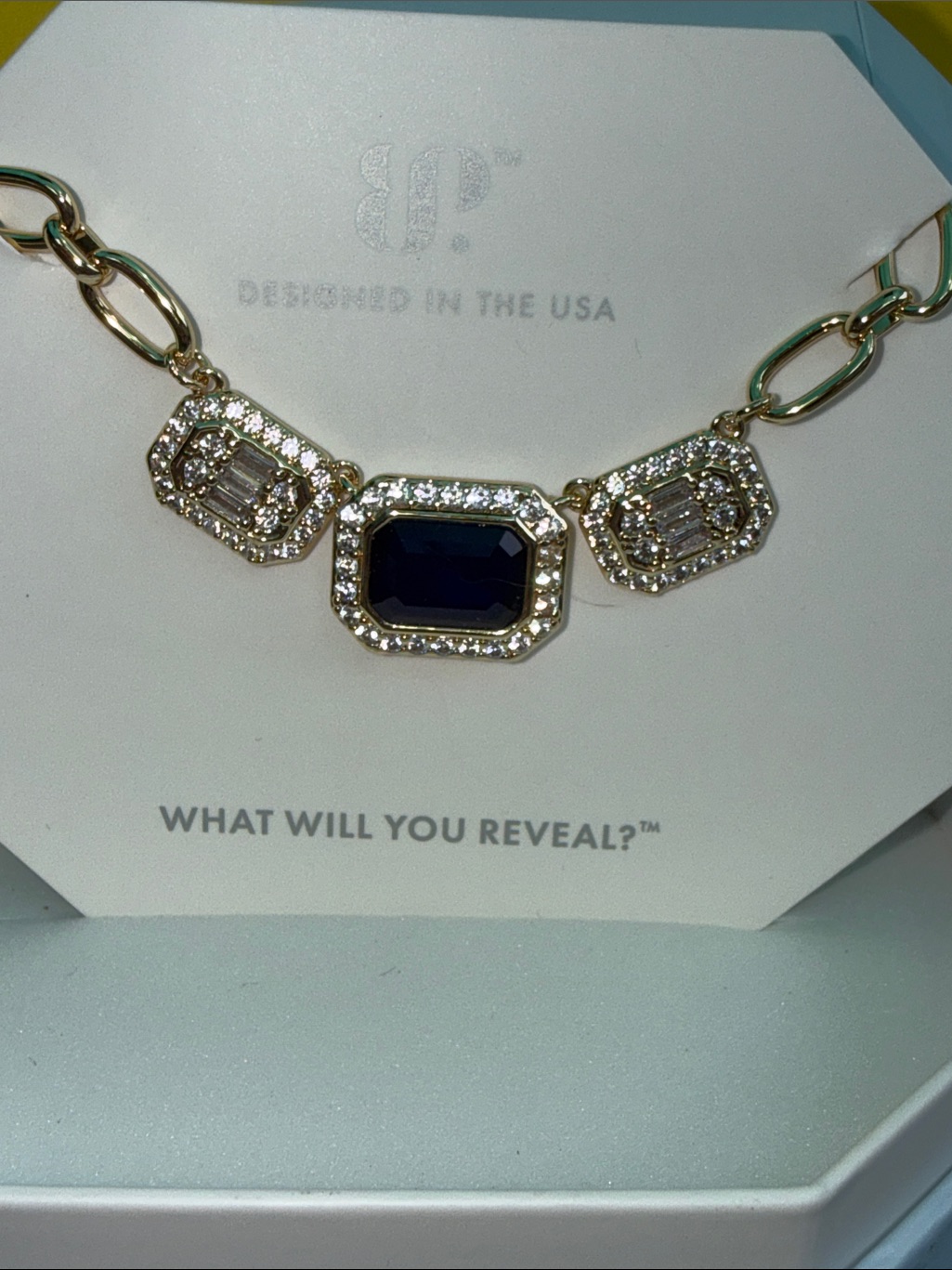 Gold-Tone Necklace With Deep Navy Center Stone And Crystal Halo